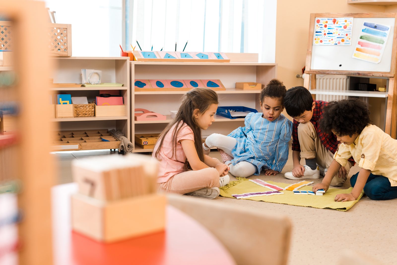 Preschoolers engaged in hands-on learning at Faith CDC