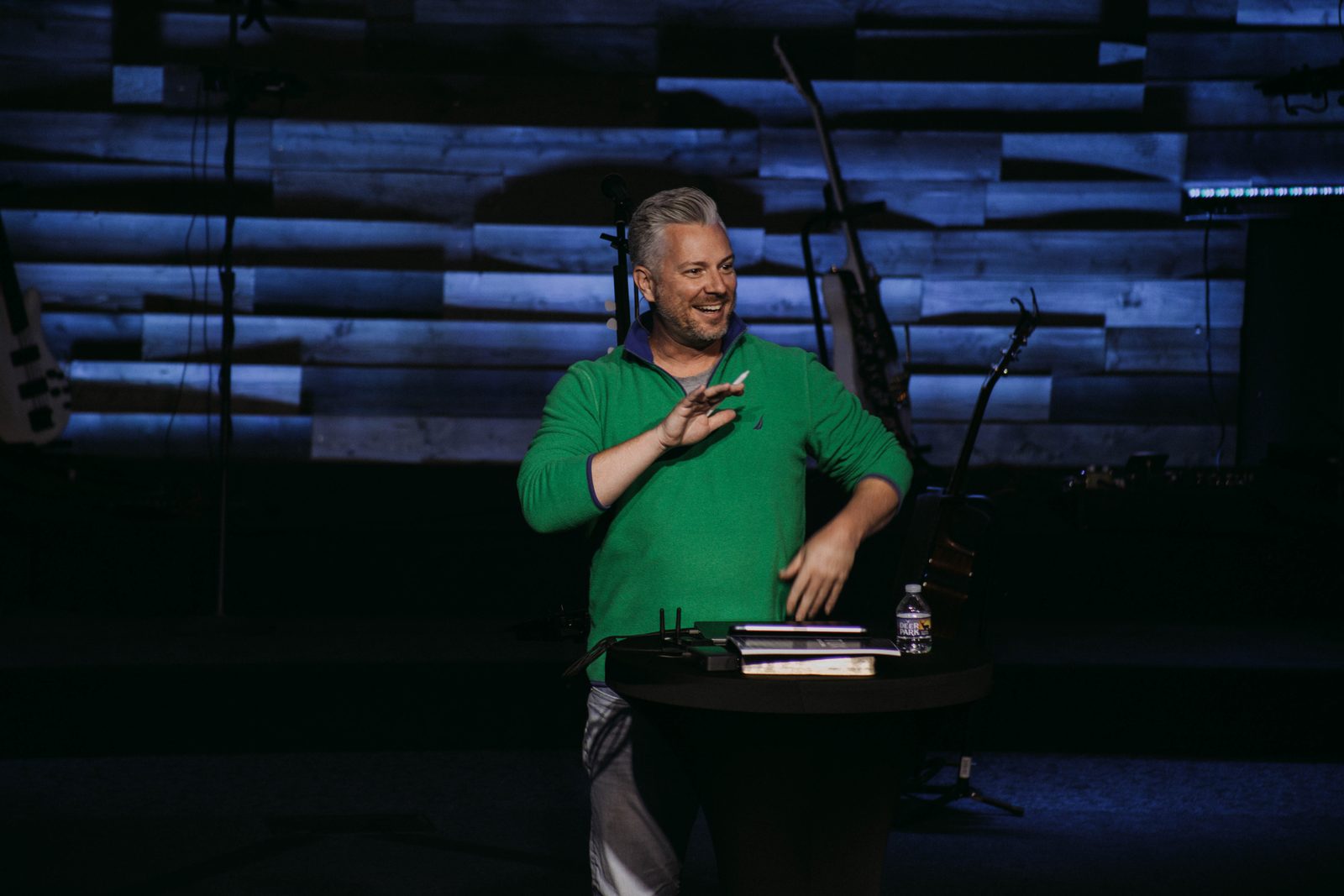 Pastor Tim Byer teaching on stage at FAITH Glen Burnie